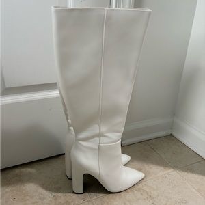 White knee high boots